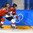 GANGNEUNG, SOUTH KOREA - FEBRUARY 12: Japan's Haruka Toko #14 stickhandles the puck away from Switzerland's Livia Altmann #22 during preliminary round action at the PyeongChang 2018 Olympic Winter Games. (Photo by Matt Zambonin/HHOF-IIHF Images)

